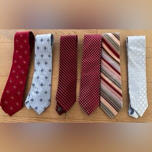 Ike Behar ties lot
Elegant Men's Tie Set - Red, Blue, and Multicolor